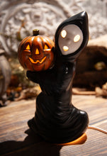 Load image into Gallery viewer, Black Ghost Holding Pumpkin

